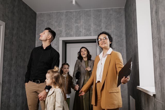 People viewing the interior of a house